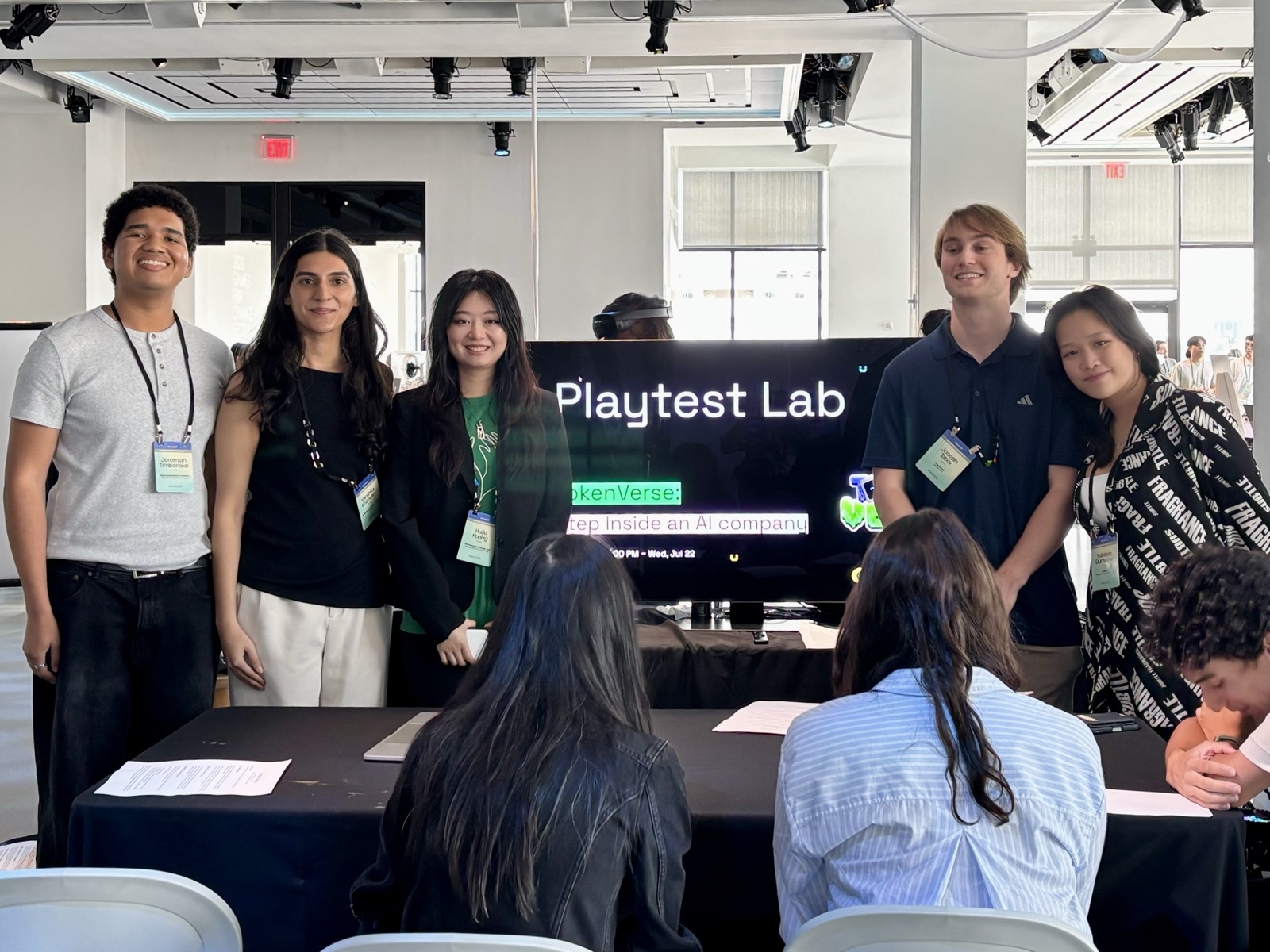 The TokenVerse team standing together at the Playtest Lab booth at Games for Change